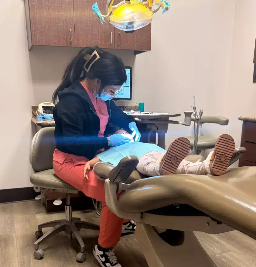 Child receiving comfortable dental care with sedation